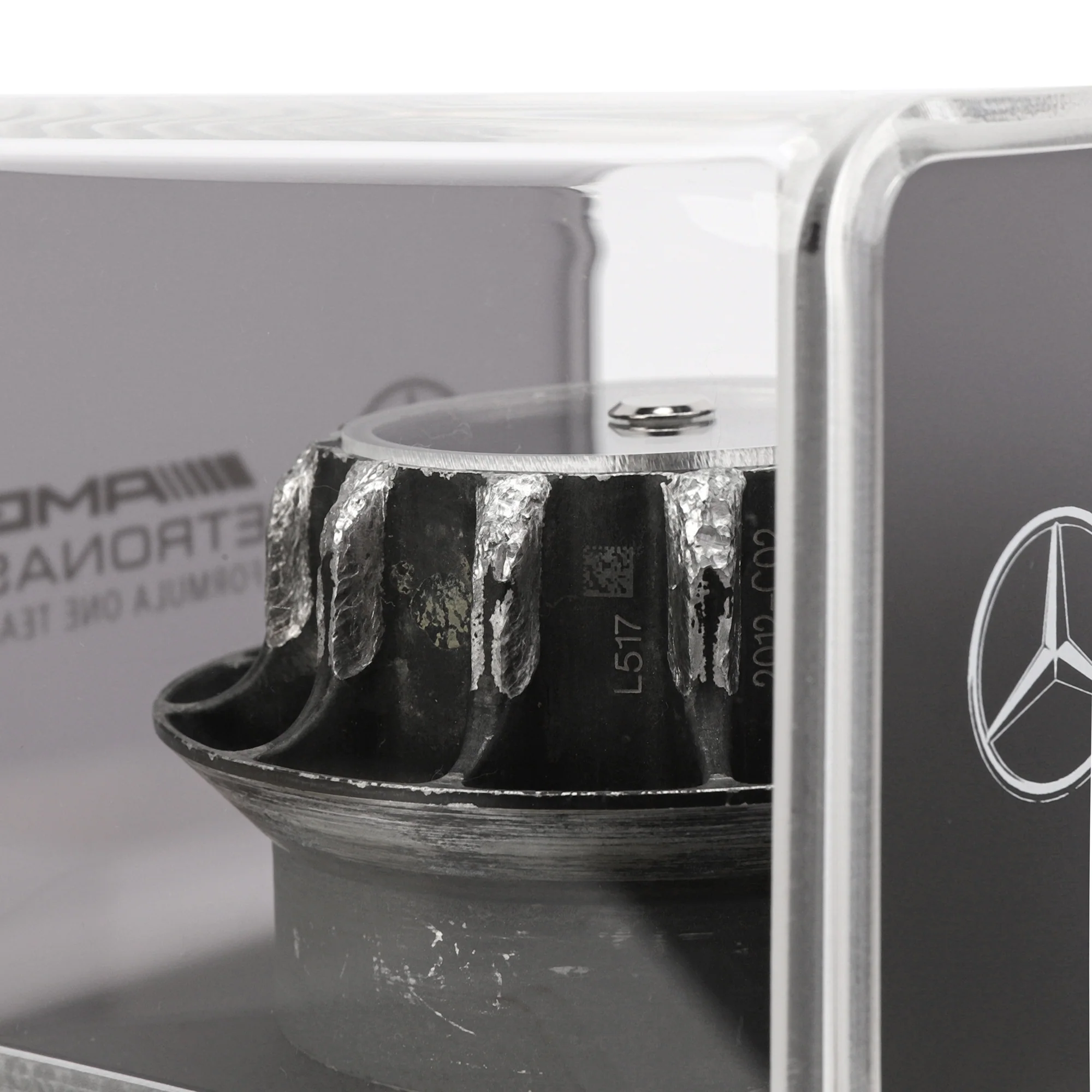 Mercedes AMG Petronas 2012 Grand Prix Used Black Wheel Nut in Display Case - Image 3